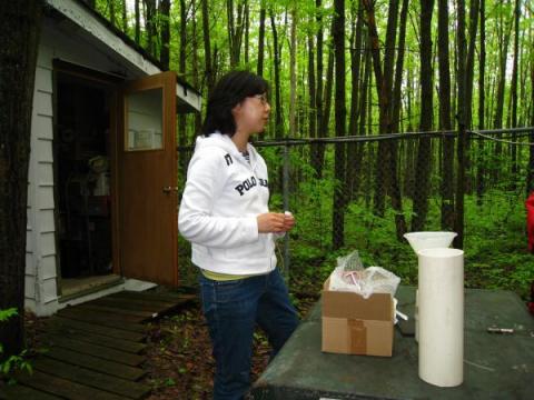 Kyounghee Kim explains sampling procedure, Borden Forest, Ontario, Canada